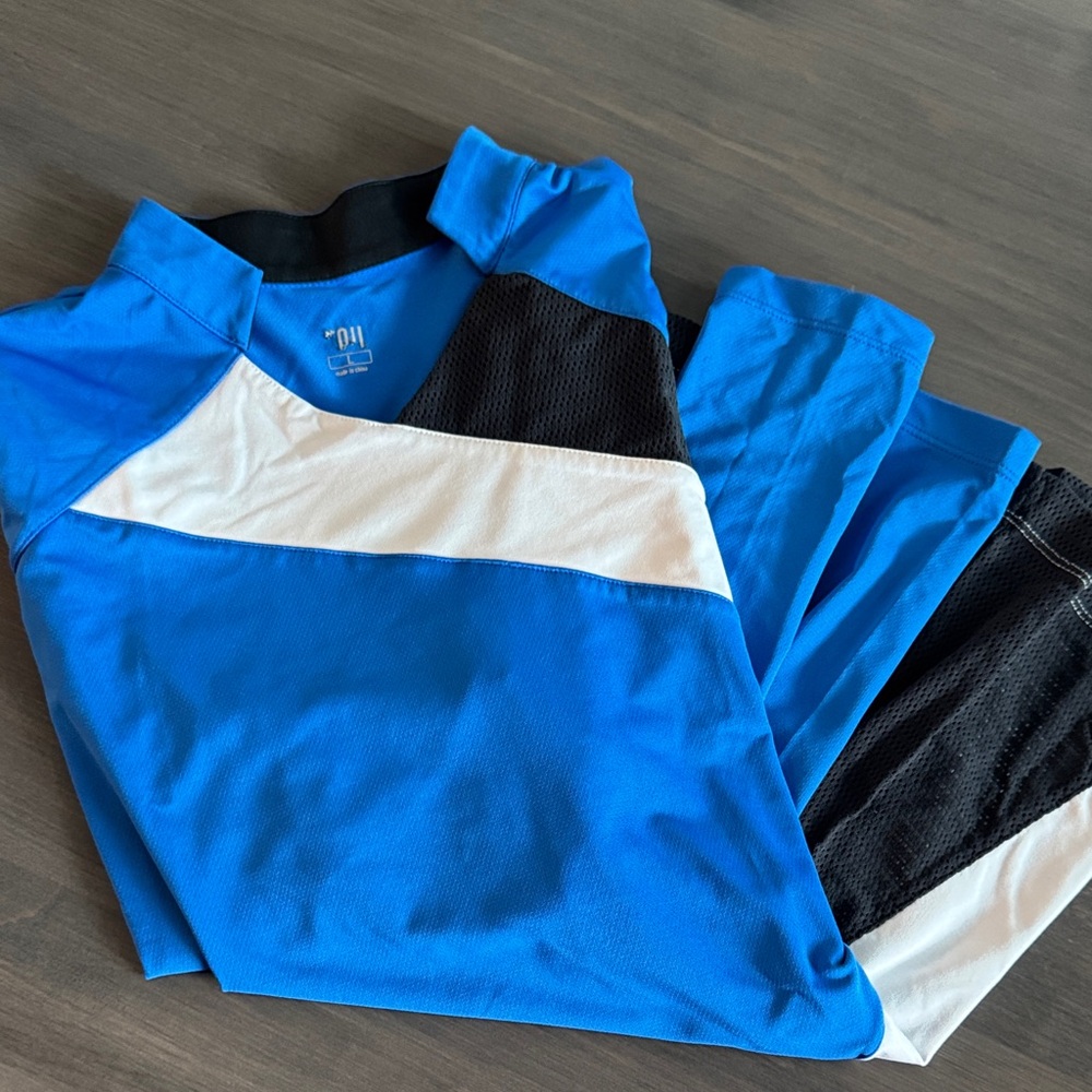 Tail Blue and Black Vented Golf Top